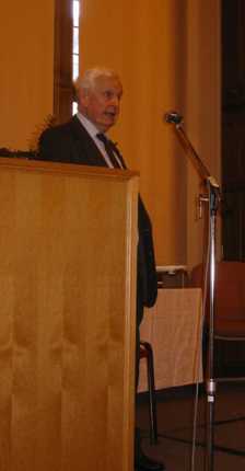 Walter
                  Carrington at lectern